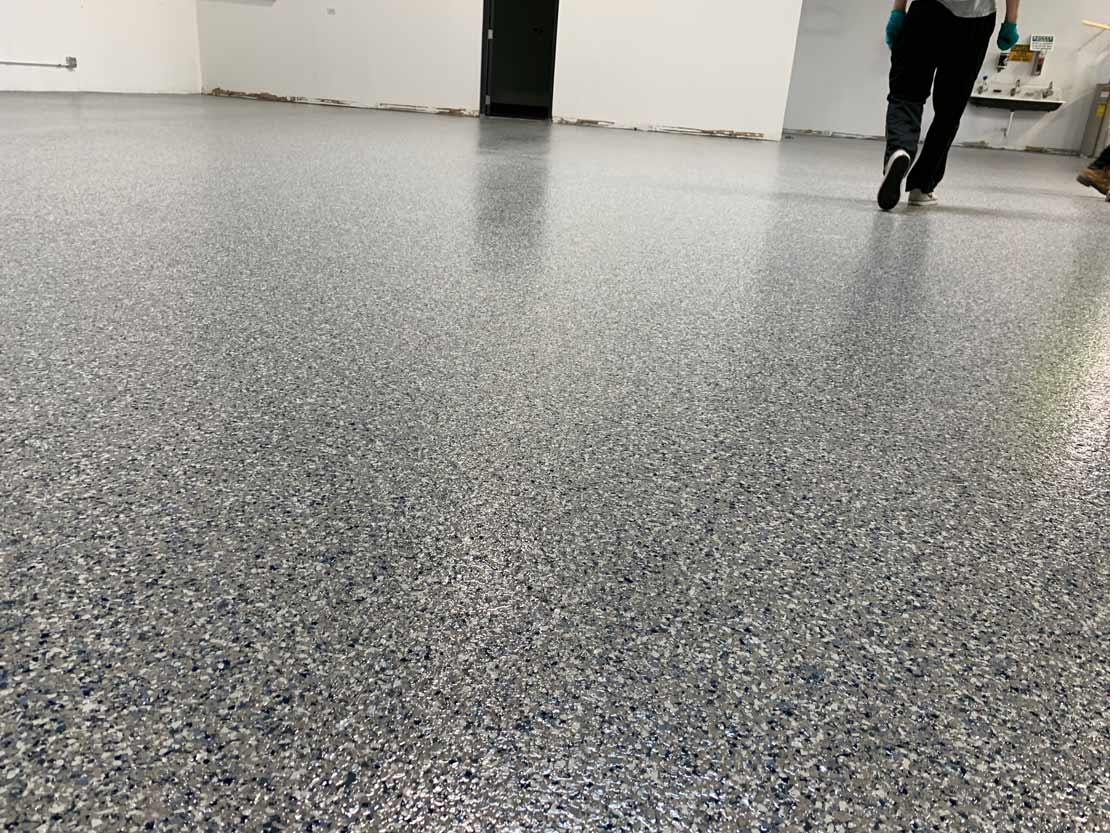 Bright showroom floor with blue support columns